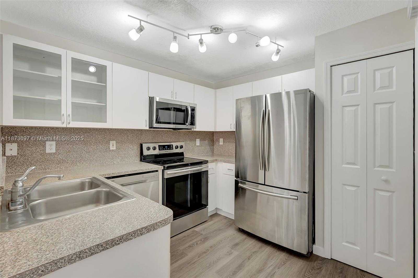 Small Image of 6141 NORTH WEST 115TH PL #352, Doral Number 2