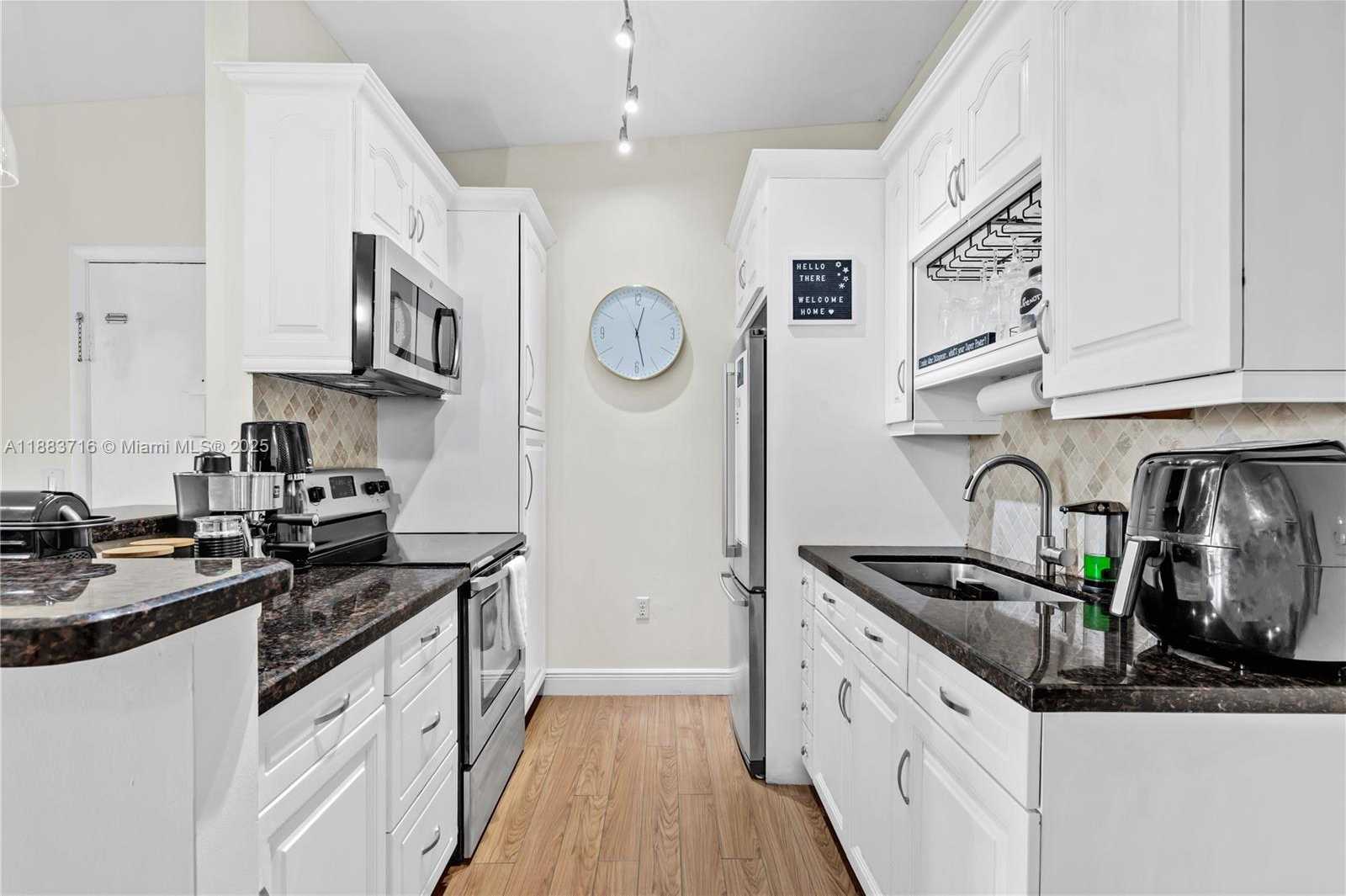 Small Image of 9731 HAMMOCKS BLVD #206B, Miami Number 6