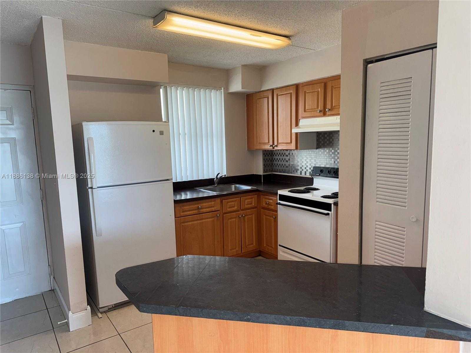 Small Image of 6045 NORTH WEST 186TH ST #323, Hialeah Number 3