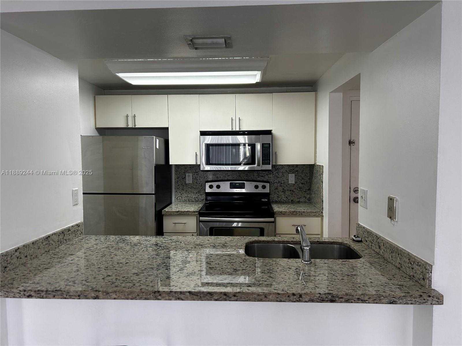 Small Image of 6955 NORTH WEST 186TH ST #F401, Hialeah Number 2