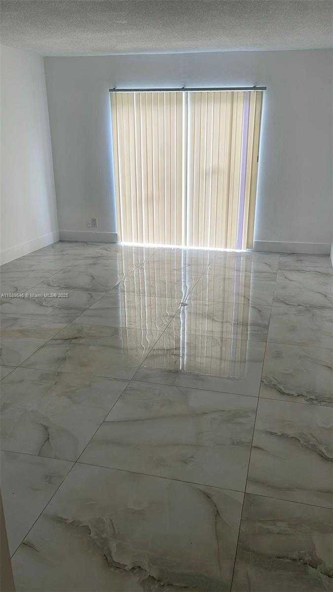 Small Image of 18111 NORTH WEST 68TH AVE #H210, Hialeah Number 3