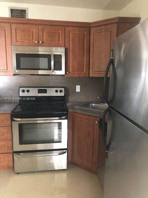 Small Image of 1002 SOUTH WEST DOUGLAS RD #1, Coral Gables Number 3