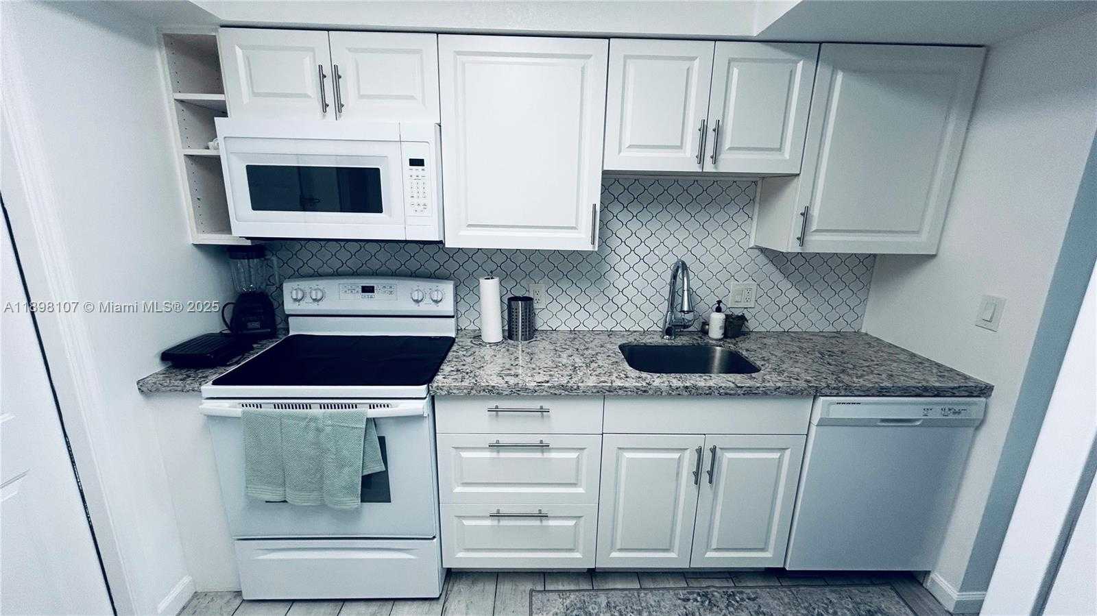 Small Image of 9971 WEST BAY HARBOR DR #303, Bay Harbor Islands Number 9