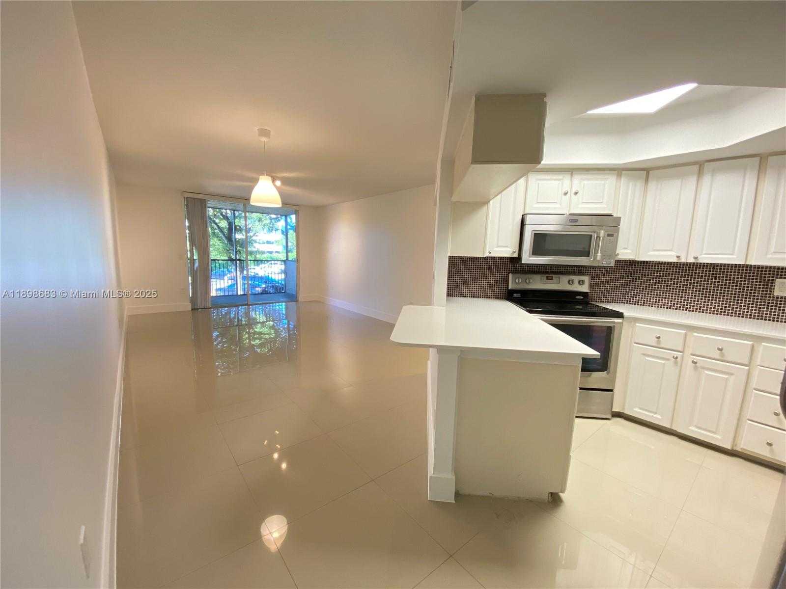 Small Image of 8363 LAKE DR #202, Doral Number 2