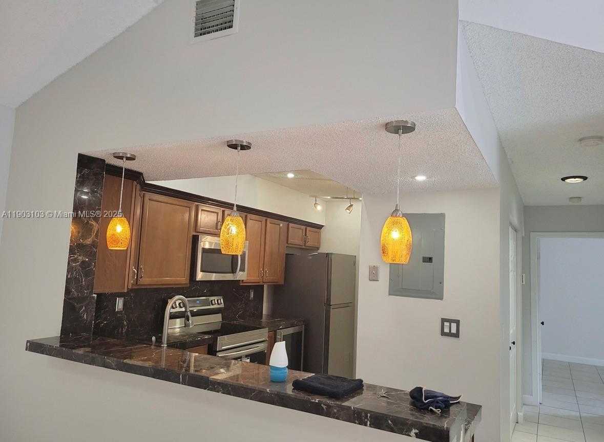 Small Image of 18850 NORTH WEST 57TH AVE #306, Hialeah Number 3