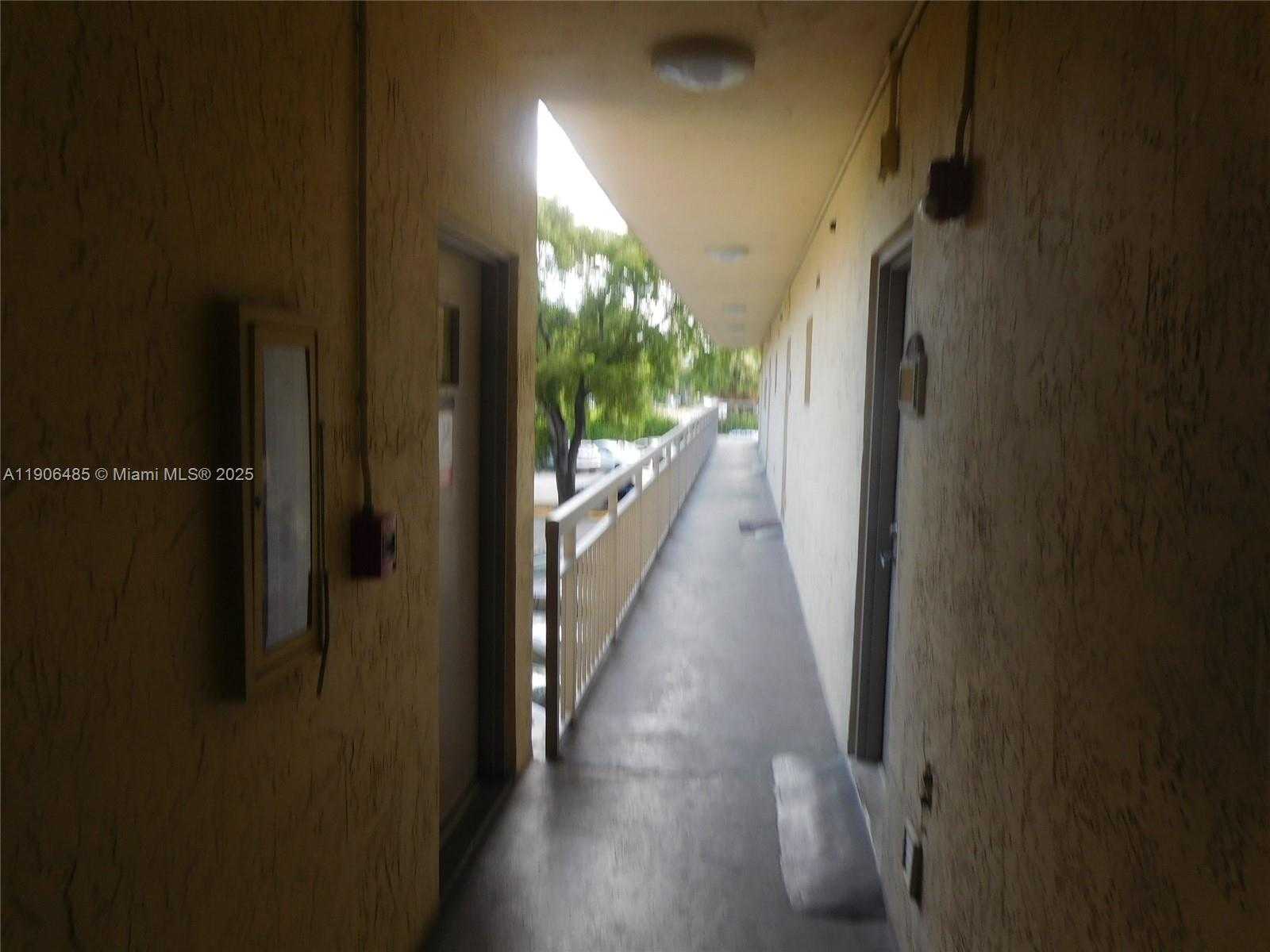 Small Image of 8290 LAKE DR #216, Doral Number 4
