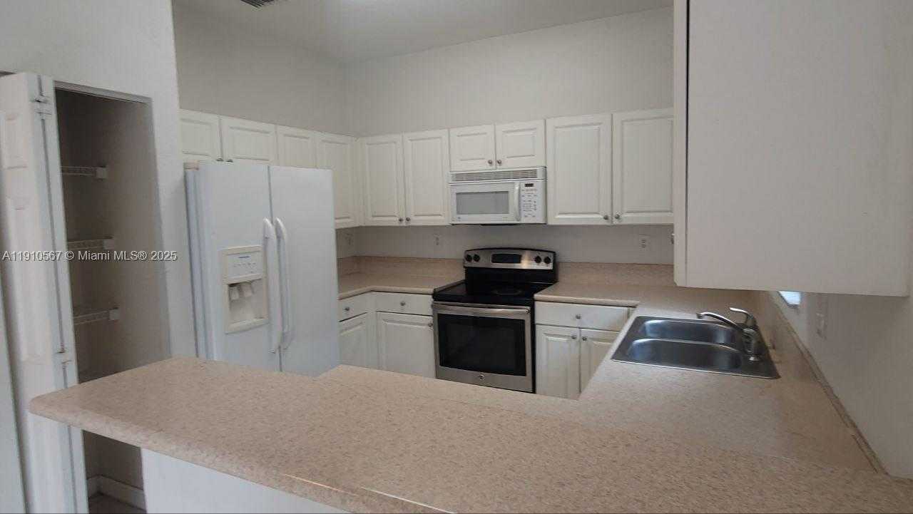 Small Image of 12874 SOUTH WEST 132ND TER #12874, Miami Number 9