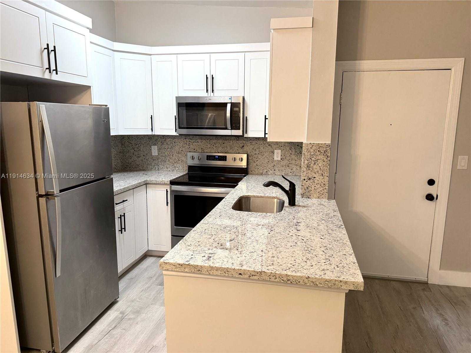 Small Image of 9719 HAMMOCKS BLVD #203, Miami Number 4