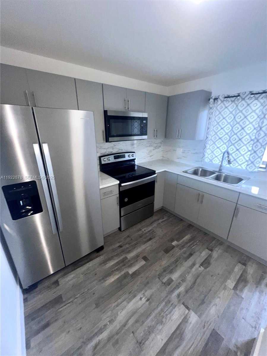 Small Image of 6715 WEST 26TH DR #203-6, Hialeah Number 1