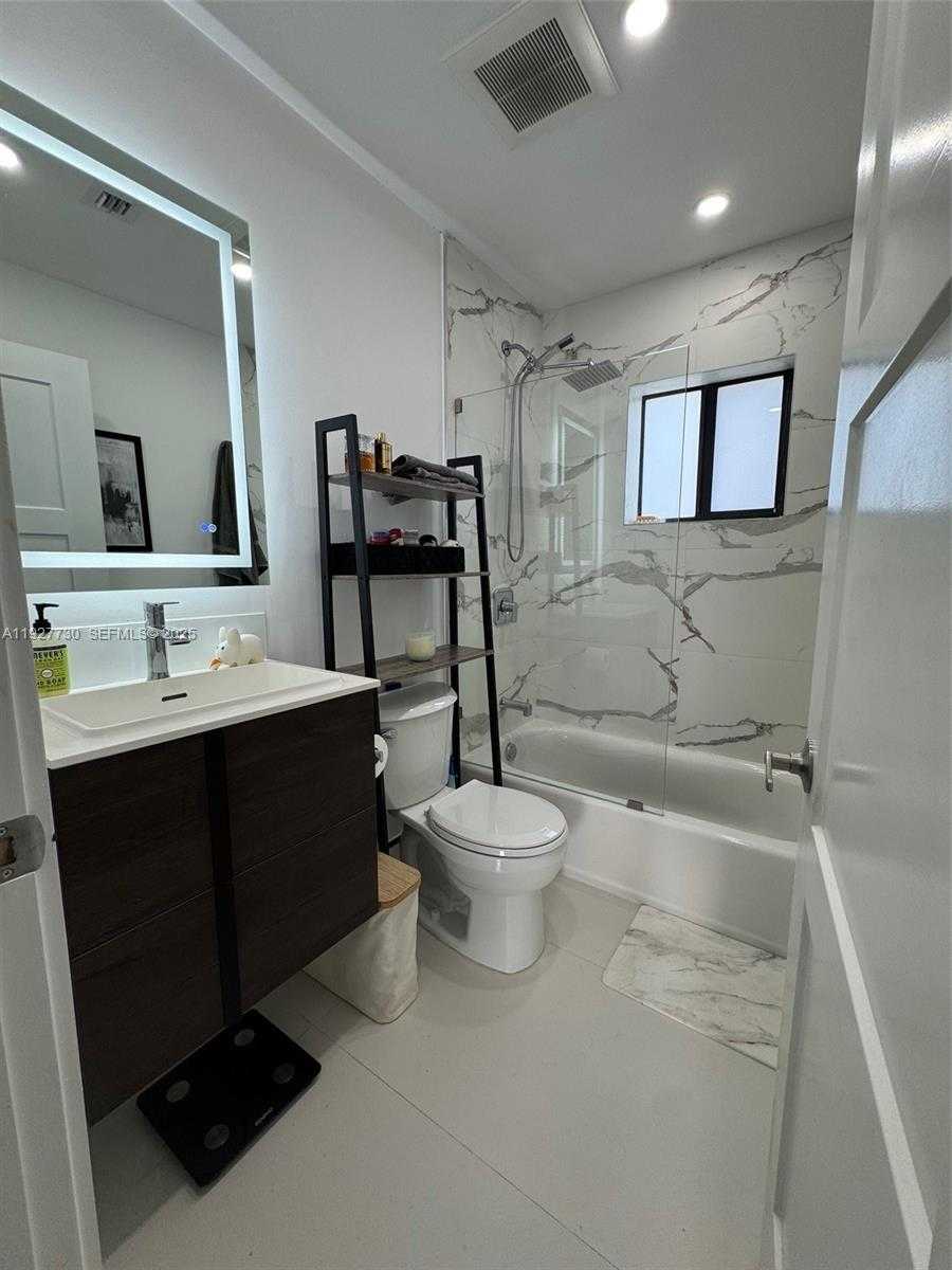 Small Image of 557 NORTH WEST 44ST #front, Miami Number 13