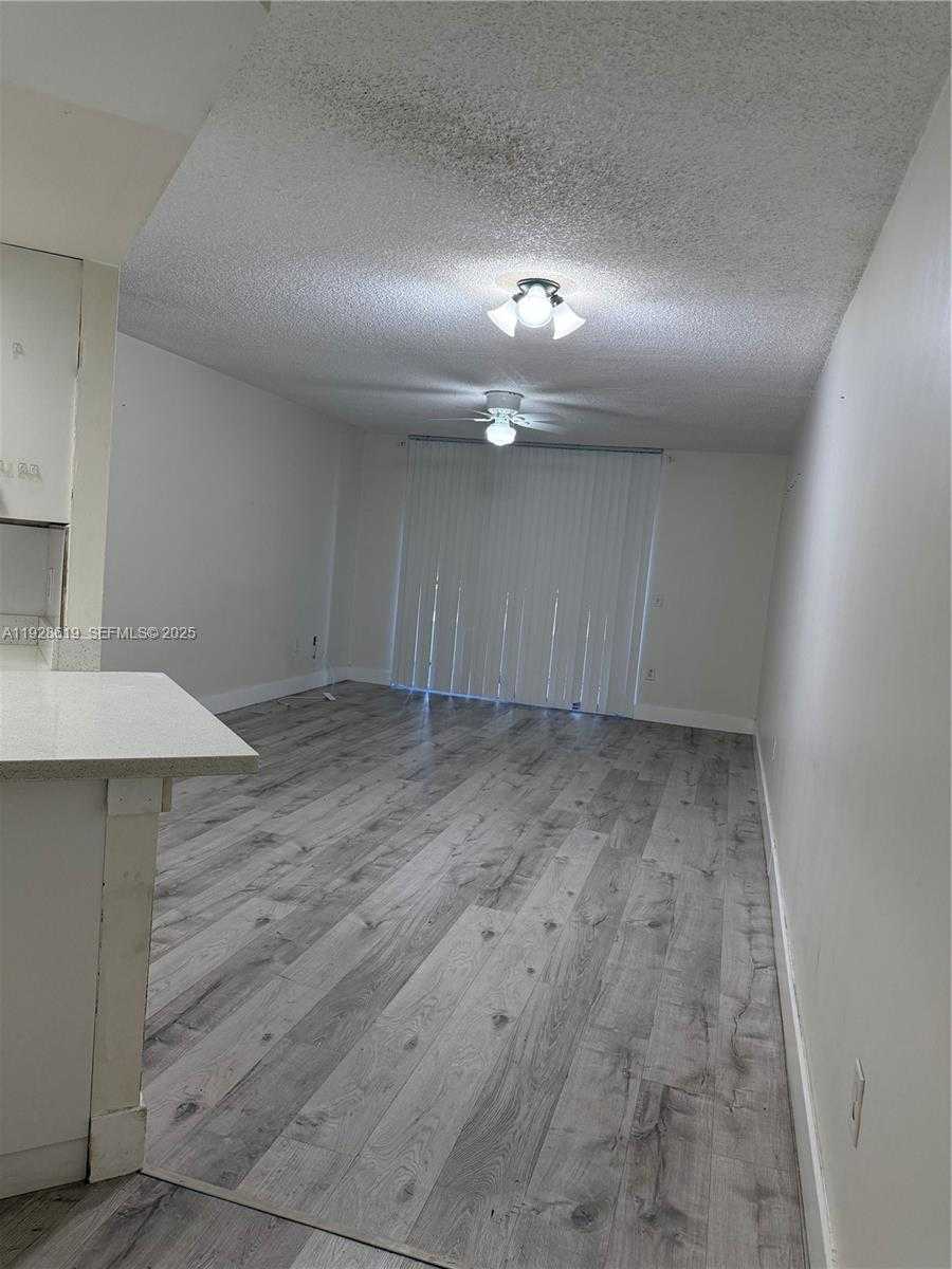 Small Image of 8353 LAKE DR #107, Doral Number 2
