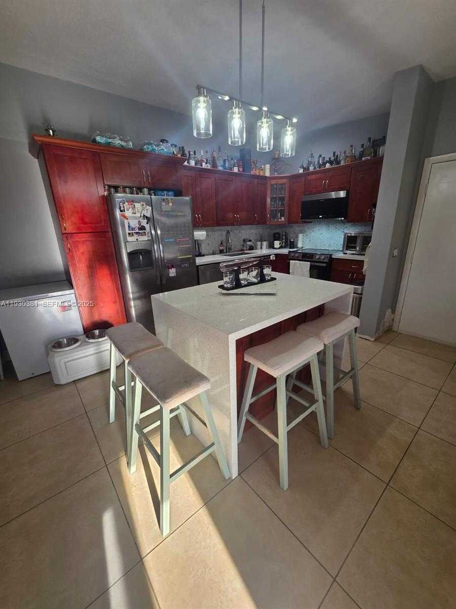 Small Image of 9727 HAMMOCKS BLVD #207D, Miami Number 1