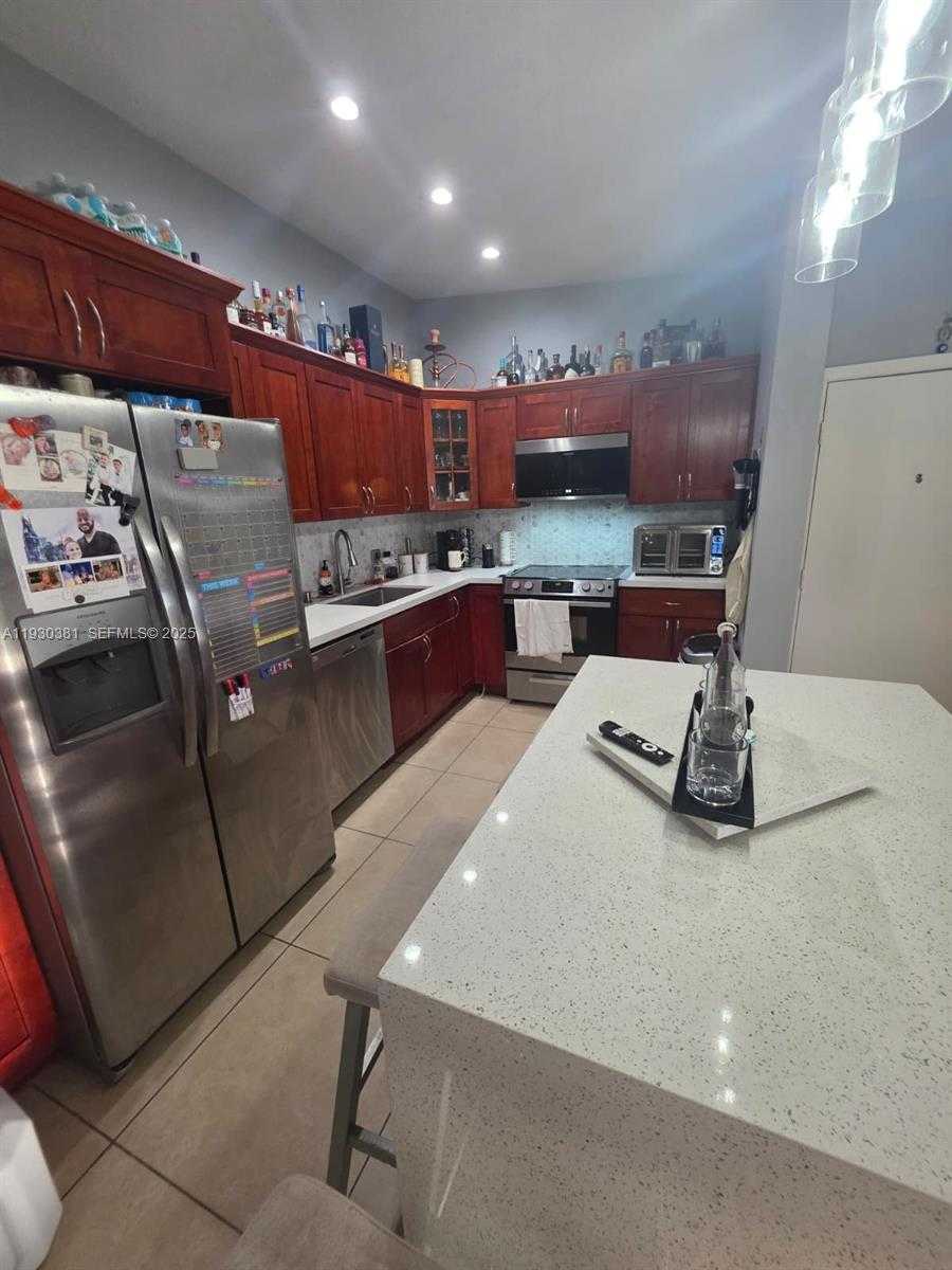 Small Image of 9727 HAMMOCKS BLVD #207D, Miami Number 3
