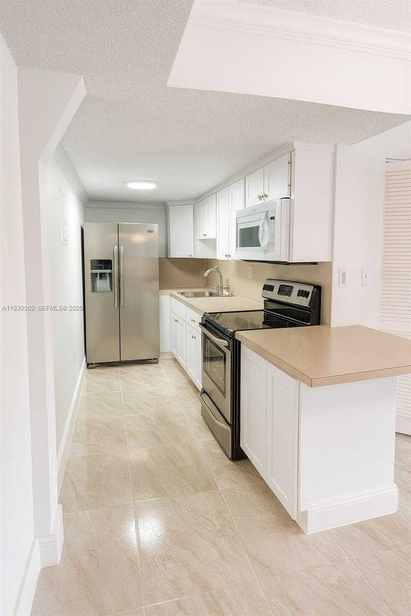 Small Image of 4705 NORTH WEST 7TH ST #106-7, Miami Number 3