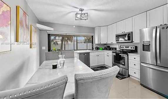 Small Image of 5404 NORTH WEST 25TH AVE #1, Tamarac Number 5