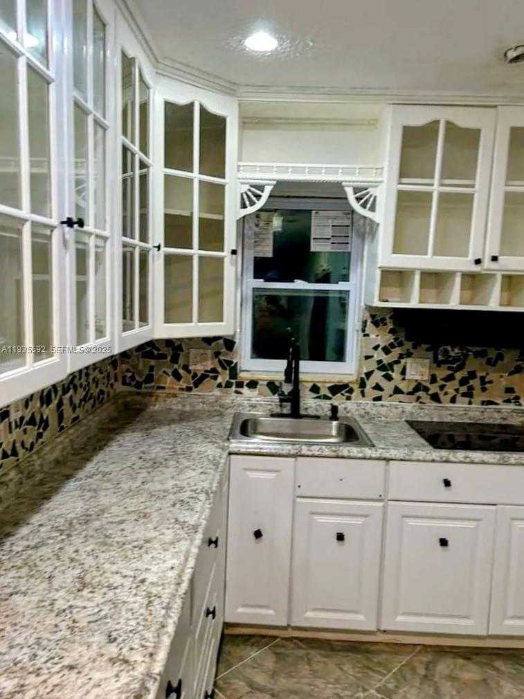 Small Image of 7601 KIMBERLY BLVD #Main, North Lauderdale Number 7