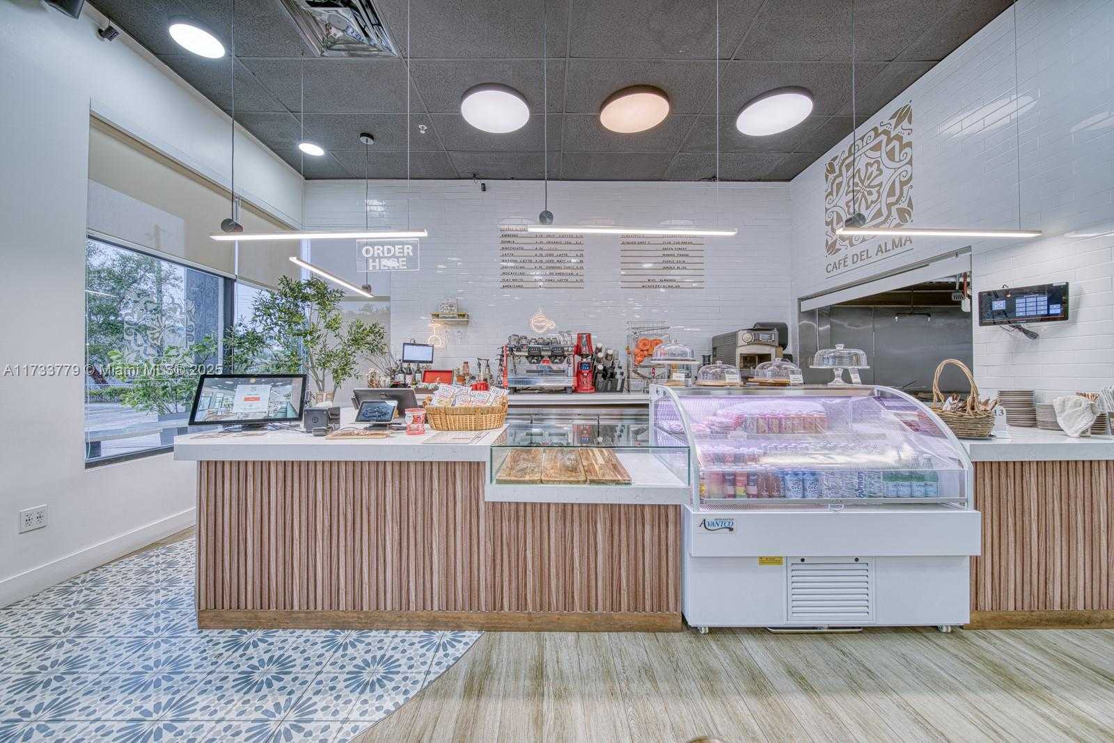 Small Image of ON BUSY BISCAYNE BOULEVARD, North Miami Beach Number 10